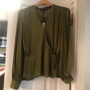 Beautiful NWT silky olive green true wrap top. ***Note fits like a large***